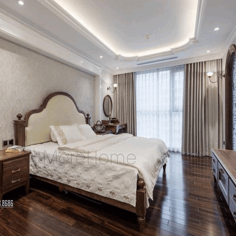 Mẫu giường ngủ gỗ cao cấp với thiết kế đầu giường bọc da màu trắng góp phần tạo nên vẻ đẹp đẳng cấp cho không gian căn phòng của gia chủ.